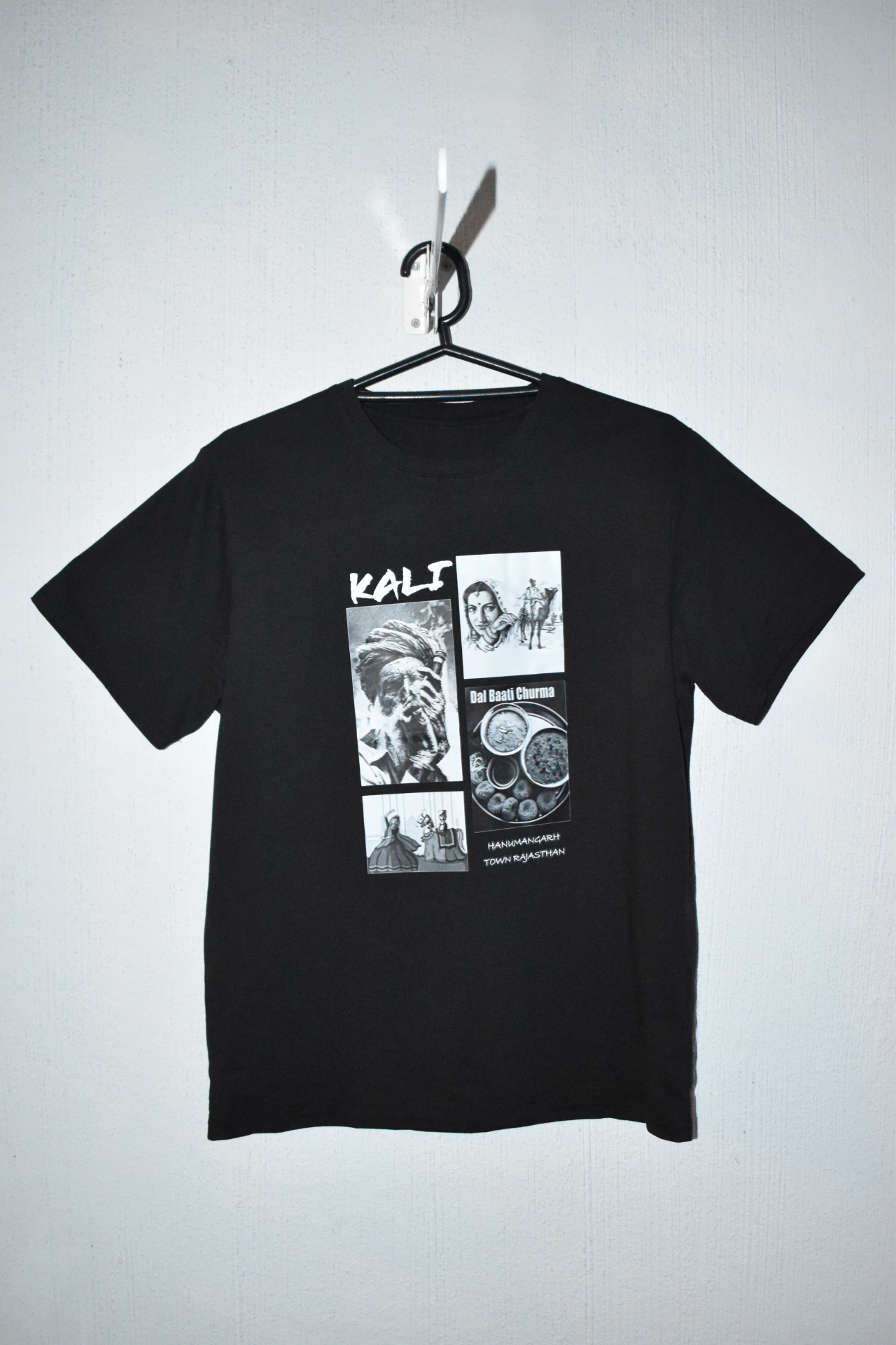Black Kali Rajasthani t-shirt with a black-and-white photo collage of Hanumangarh, Rajasthan